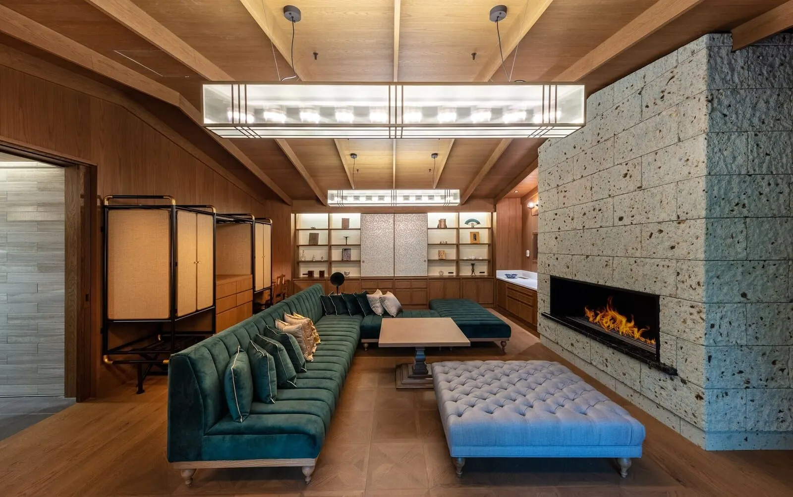 Fufu Nikko: The lounge with a stone fireplace