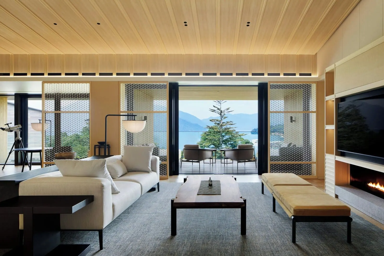 The Ritz-Carlton, Nikko: A suite living room with a lake view